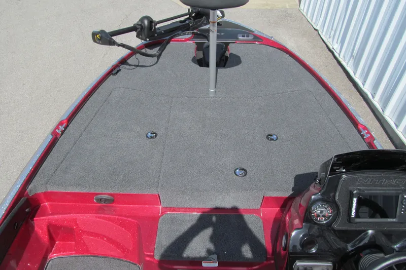 Slide: The Image of 2026 Nitro Z17 boat deck with trolling motor and control panel. - 96