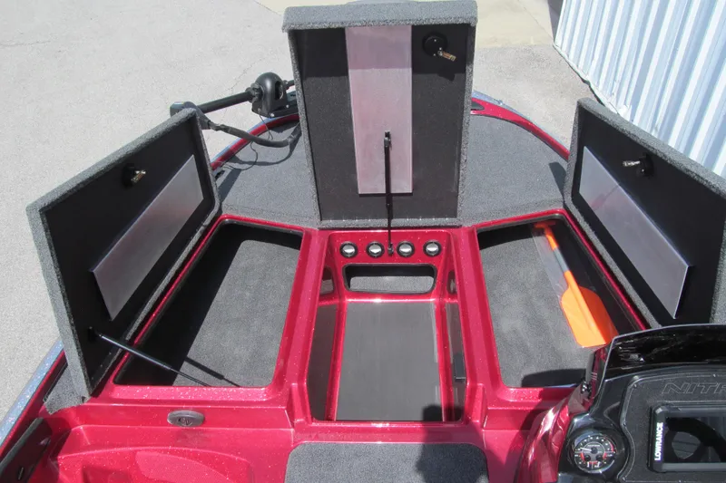 Slide: The Image of Open storage compartments on a 2026 Nitro Z17 boat deck. - 97
