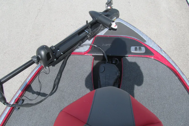 Slide: The Image of Red and gray Nitro Z17 boat deck with trolling motor, 2026 model. - 98