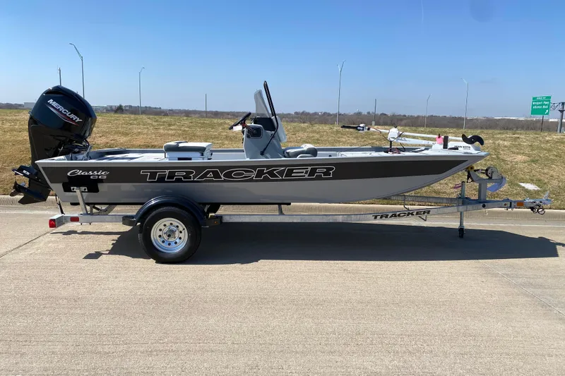 Slide: The Image of 2026 Tracker Bass Tracker Classic CC boat on trailer, side view. - 2