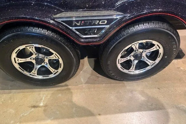 Slide: The Image of 2026 Nitro Z21 XL trailer with dual wheels on display. - 14