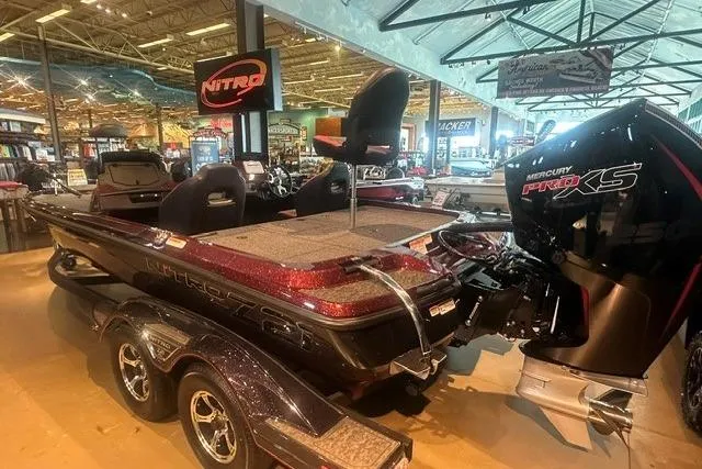 Slide: The Image of 2026 Nitro Z21 XL boat with Mercury Pro XS engine displayed in showroom. - 5