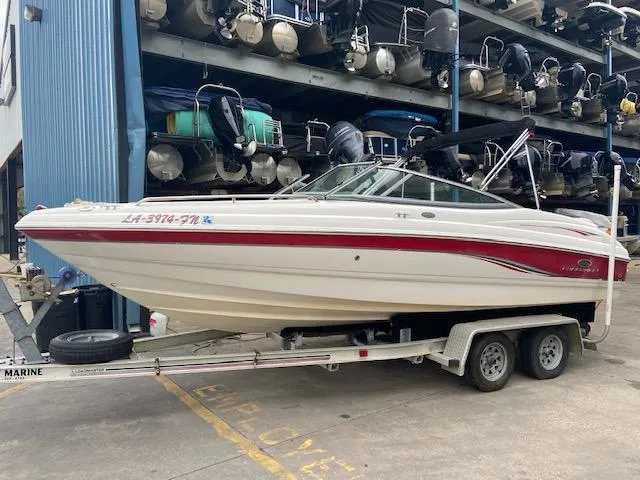 Slide: The Image of 2006 Chaparral 210 SSi boat on trailer in storage facility. - 0