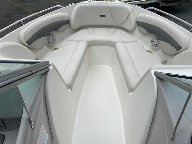 Slide: The Image of Interior view of a 2006 Chaparral 210 SSi boat with white seating. - 13