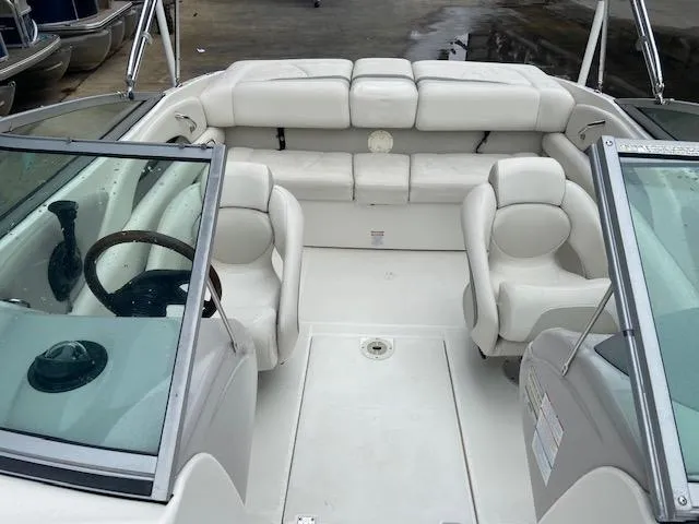 Slide: The Image of Interior of a 2006 Chaparral 210 SSi boat with white seating. - 14