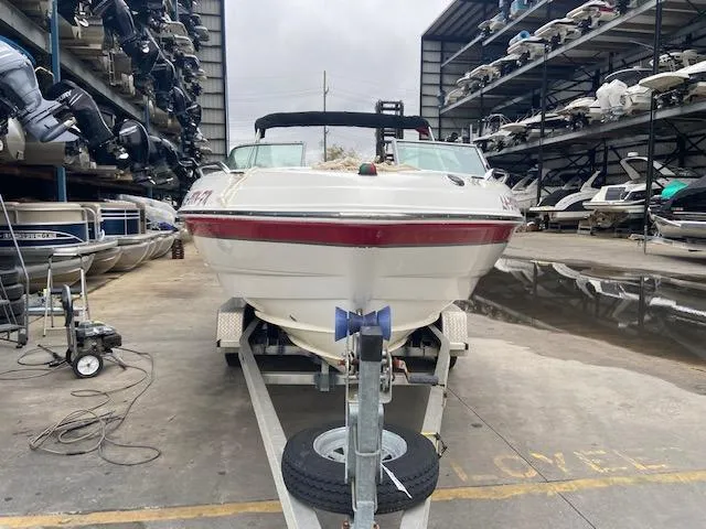 Slide: The Image of 2006 Chaparral 210 SSi boat on trailer in storage facility. - 2