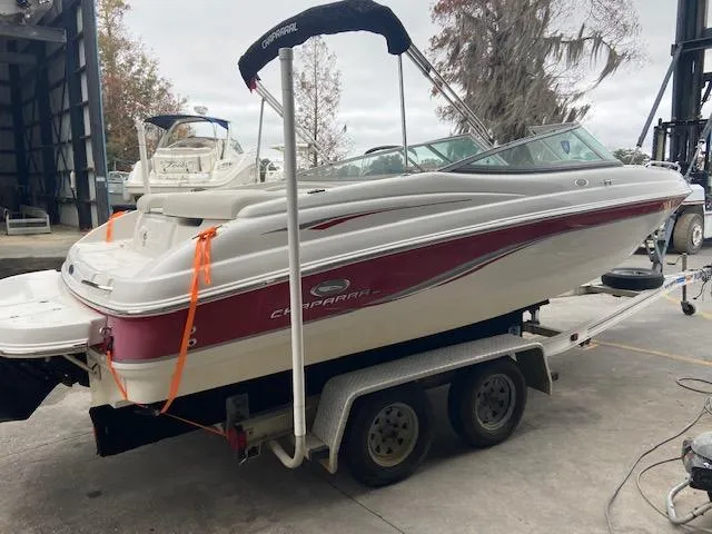 Slide: The Image of 2006 Chaparral 210 SSi boat on trailer outdoors. - 4