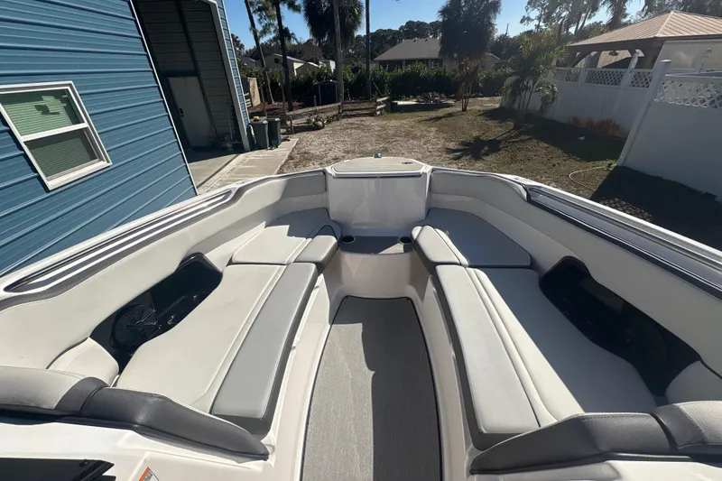 Slide: The Image of 2025 Yamaha Boats AR250 interior with sleek seating and modern design. - 15