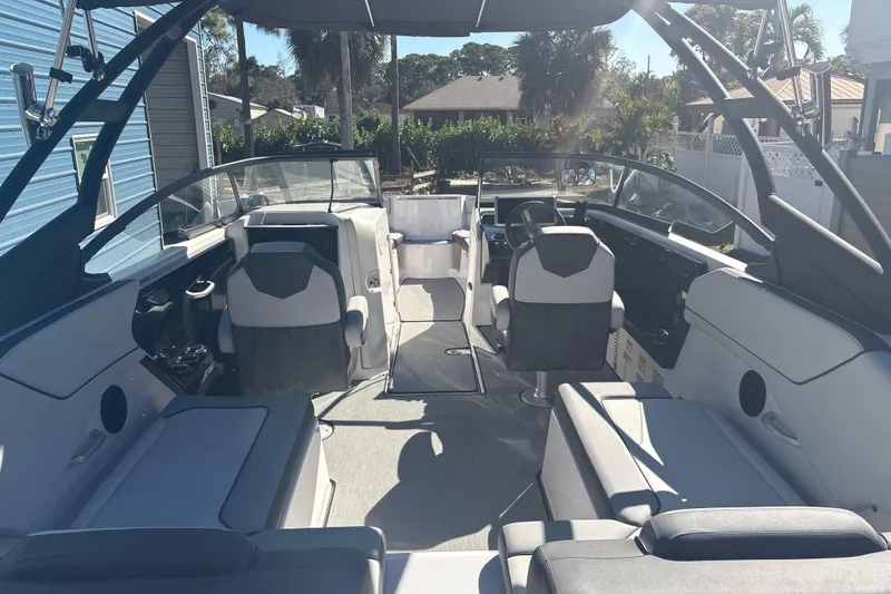 Slide: The Image of 2025 Yamaha AR250 boat engine compartment with dual high-output engines. - 19