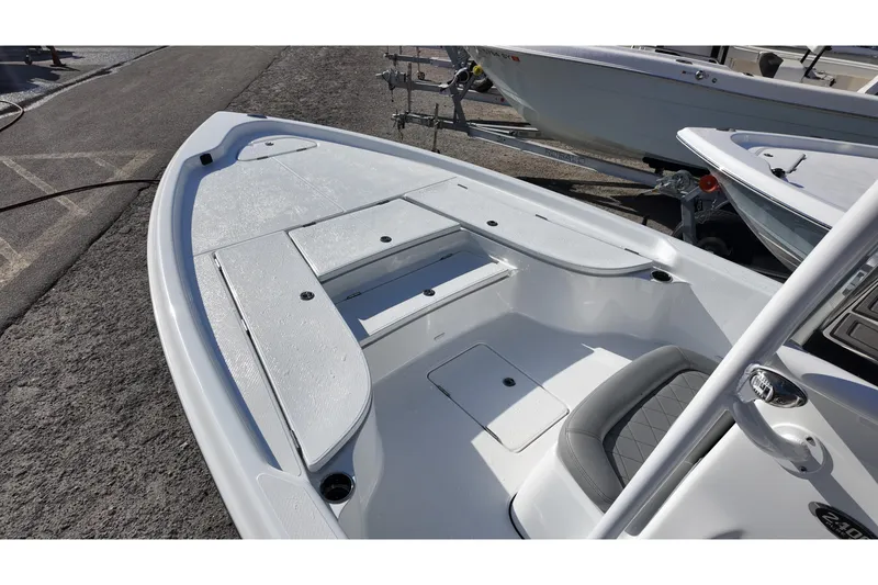 Slide: The Image of 2026 Blazer PureBay 2400 boat interior with seating and storage compartments. - 5