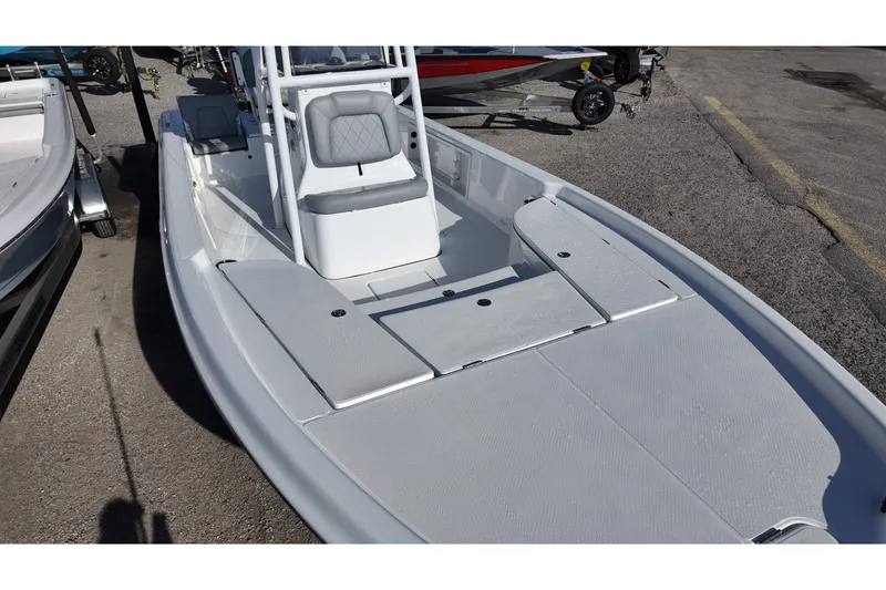 Slide: The Image of 2026 Blazer PureBay 2400 boat with sleek design and spacious deck. - 7