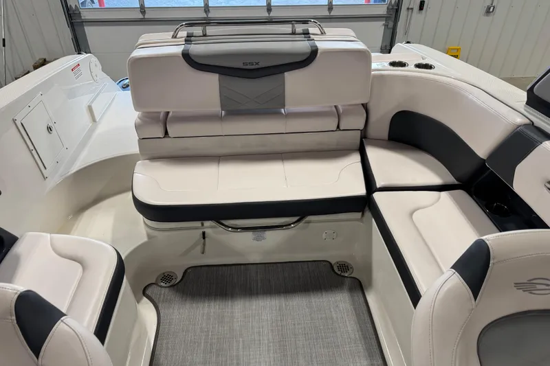 Slide: The Image of 2020 Chaparral 257 SSX boat interior with luxurious seating and modern design. - 11