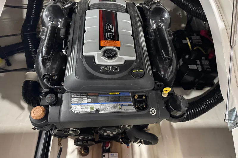 Slide: The Image of Engine compartment of a 2020 Chaparral 257 SSX boat, featuring a 6.2L Mercury engine. - 18