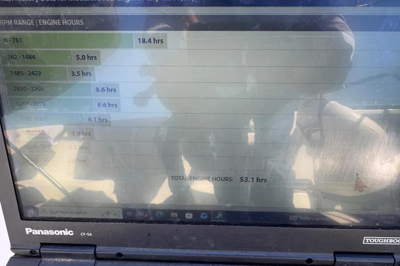 Slide: The Image of Panasonic Toughbook displaying engine hours for 2020 Chaparral 257 SSX boat. - 19