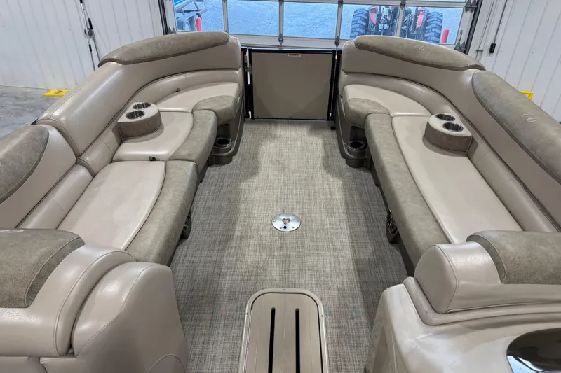 Slide: The Image of Luxurious interior of 2019 Avalon 2585 Catalina pontoon boat with plush seating and cup holders. - 11
