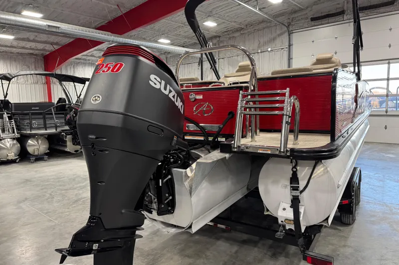 Slide: The Image of 2019 Avalon 2585 Catalina pontoon boat with Suzuki 250 outboard motor in a showroom. - 7