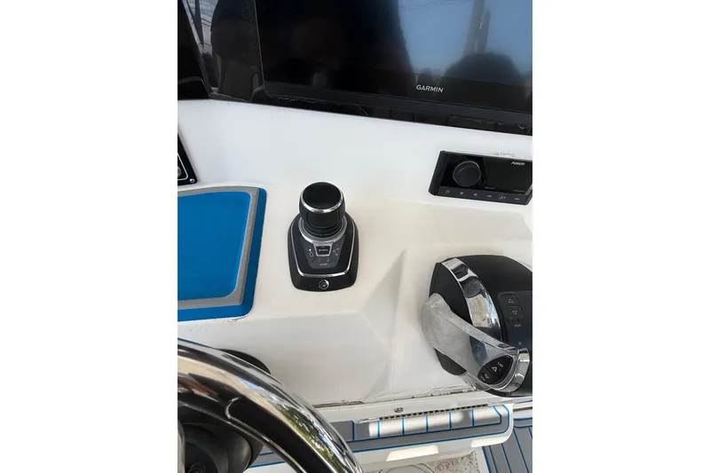 Slide: The Image of Control panel of 2022 Sea Fox 328 Commander with Garmin display and joystick. - 12