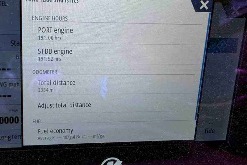 Slide: The Image of Display screen showing engine hours and odometer for 2022 Sea Fox 328 Commander. - 15