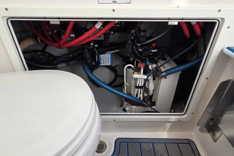 Slide: The Image of 2022 Sea Fox 328 Commander boat plumbing and wiring compartment. - 25