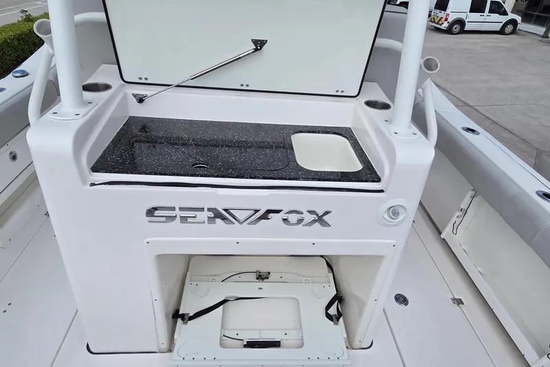 Slide: The Image of 2022 Sea Fox 328 Commander boat with sink and storage area. - 29