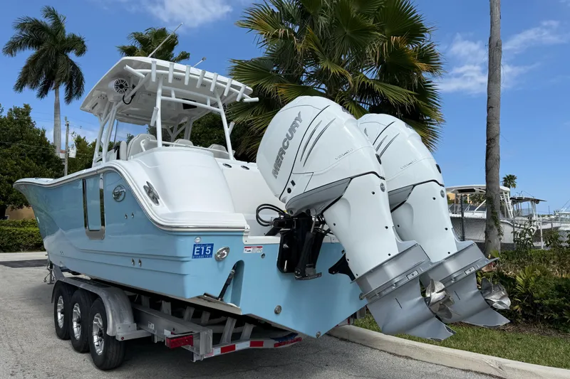Slide: The Image of 2022 Sea Fox 328 Commander boat with dual Mercury engines on a trailer. - 3