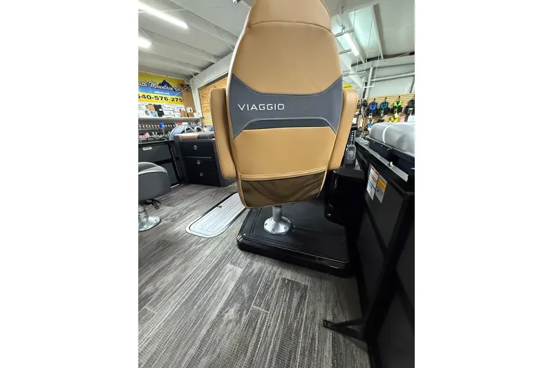Slide: The Image of Viaggio Z22S 2025 model seat in a showroom with wood flooring. - 16