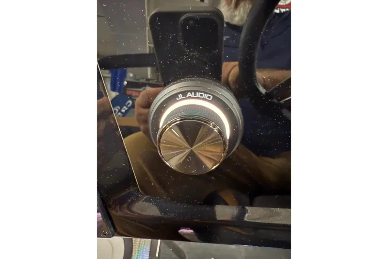 Slide: The Image of Viaggio Z22S 2025 featuring JL Audio control knob on sleek dashboard. - 20