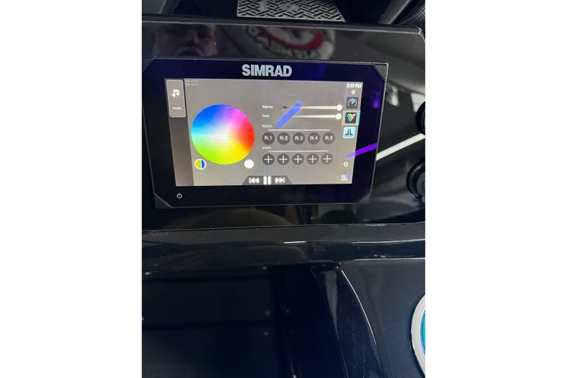 Slide: The Image of Simrad touchscreen interface displaying color wheel on Viaggio Z22S, 2025 model. - 21