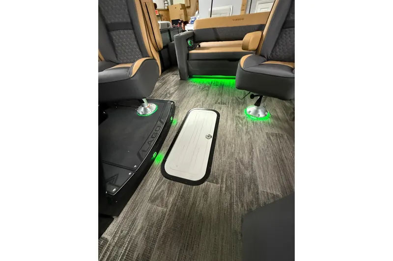 Slide: The Image of 2025 Viaggio Z22S interior with modern seating and ambient green lighting. - 26