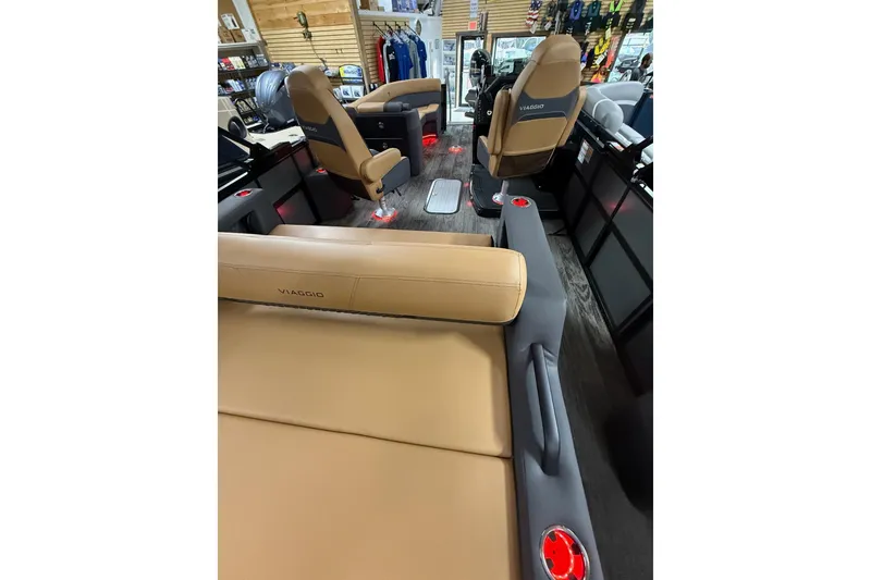 Slide: The Image of Interior of 2025 Viaggio Z22S boat with tan seating and modern design. - 30