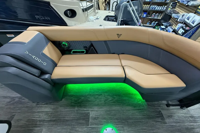 Slide: The Image of Luxurious Viaggio Z22S 2025 boat seating with ambient green lighting and modern design. - 32
