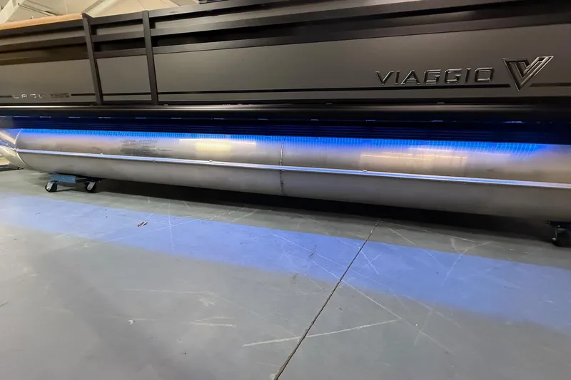 Slide: The Image of 2025 Viaggio Z22S pontoon boat with blue LED lighting on display. - 33