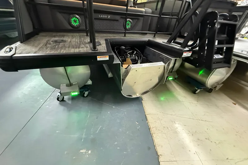 Slide: The Image of 2025 Viaggio Z22S pontoon boat with green LED lights and aluminum pontoons. - 35