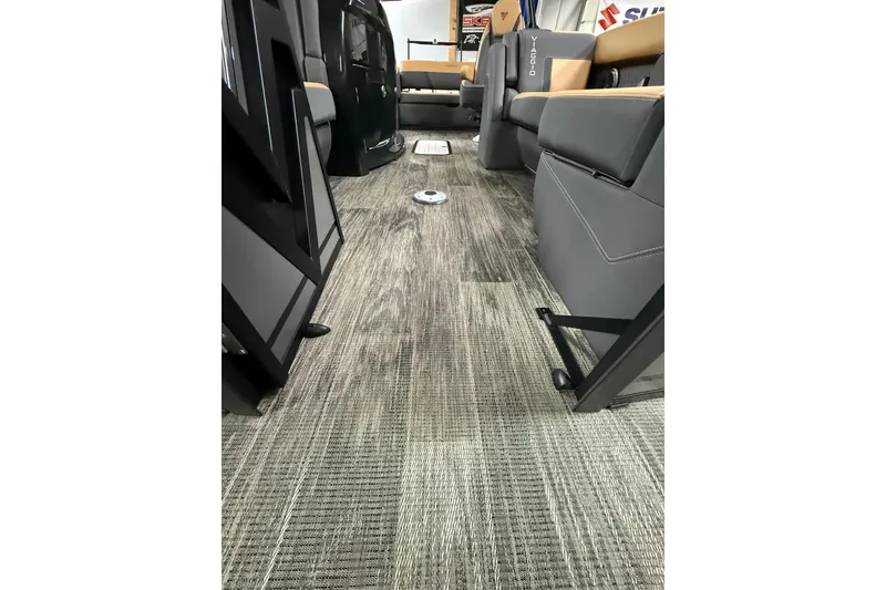 Slide: The Image of Interior of 2025 Viaggio Z22S boat with modern seating and stylish flooring. - 9