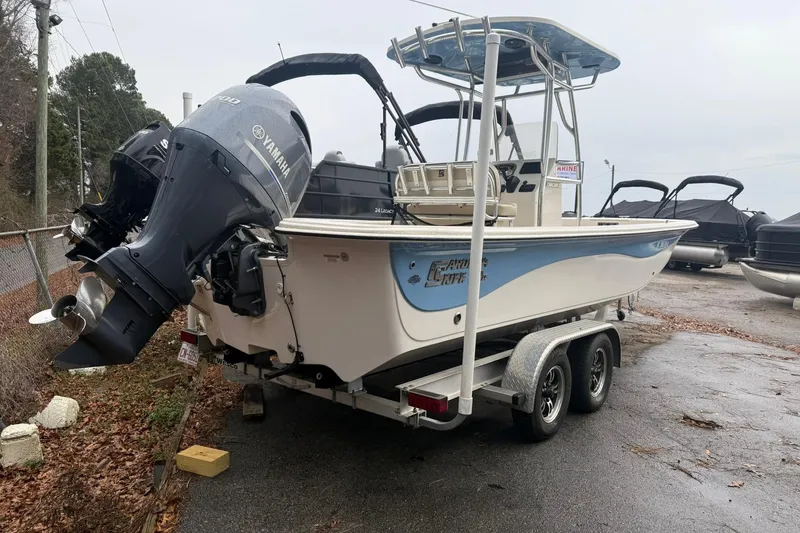 Slide: The Image of 2022 Carolina Skiff 23 LS boat with Yamaha engine on a trailer. - 3