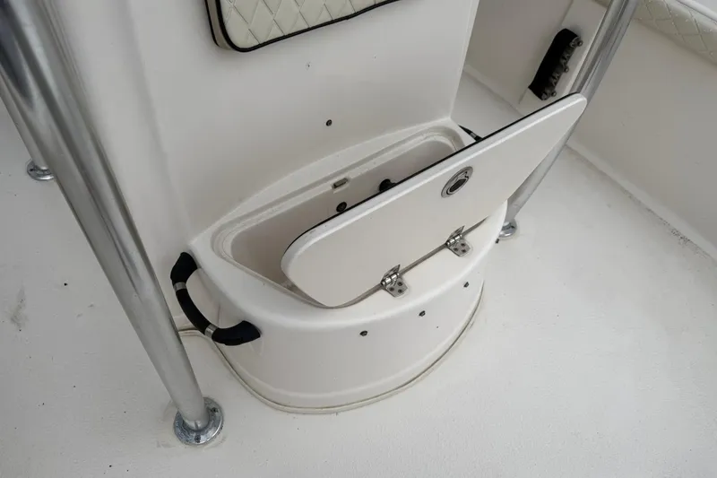 Slide: The Image of Open storage compartment on 2022 Carolina Skiff 23 LS boat interior. - 9