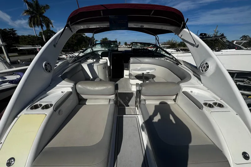 Slide: The Image of Interior of a 2005 Cobolt 36 boat with seating and cup holders. - 3
