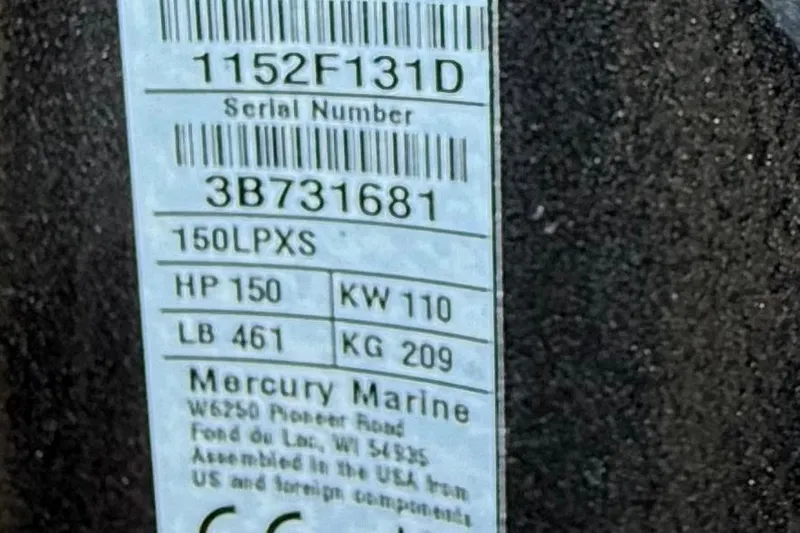 Slide: The Image of Label on Mercury Marine engine, showing serial number and specifications for Thor Lake Hammer 1900SC, 2026. - 11