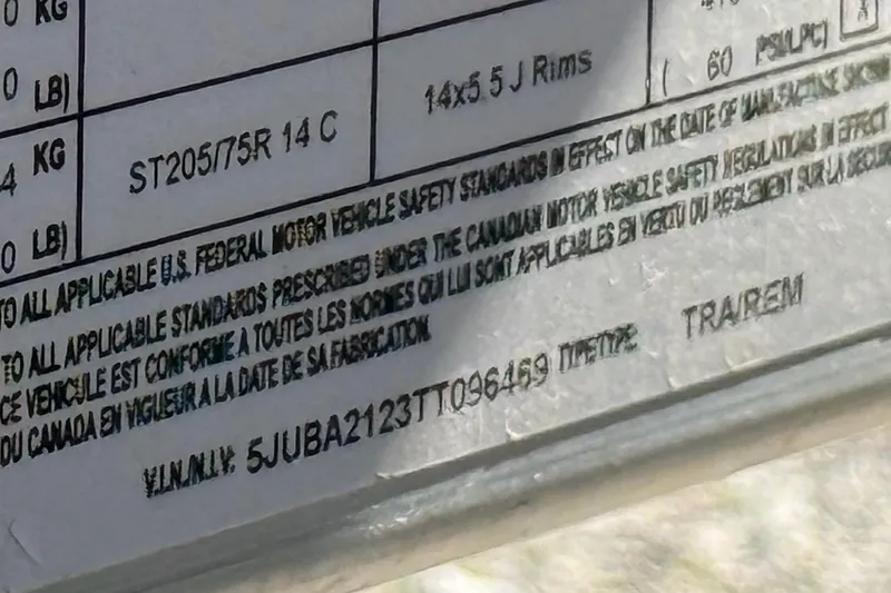 Slide: The Image of VIN label on a 2026 Thor Lake Hammer 1900SC, showing tire and safety information. - 12