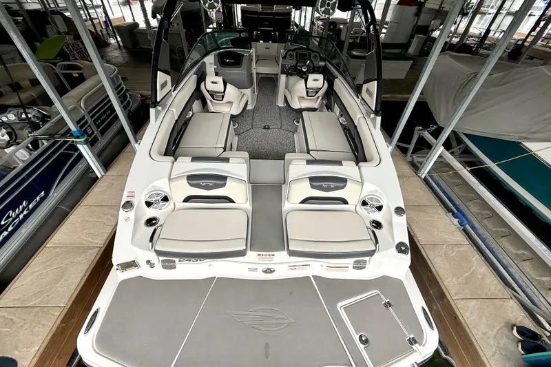 Slide: The Image of 2018 Chaparral Vortex 2430 VRX boat interior with spacious seating and modern design. - 17