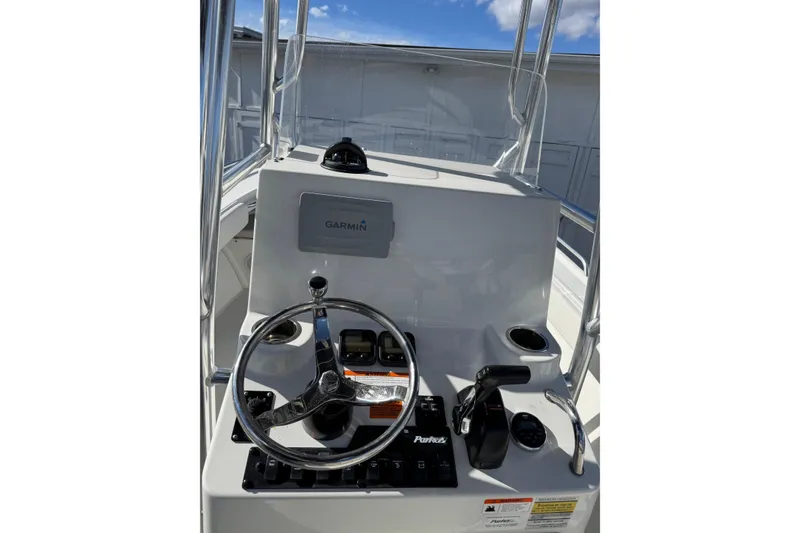 Slide: The Image of 2015 Parker 21SE Center Console boat dashboard with Garmin navigation system. - 6