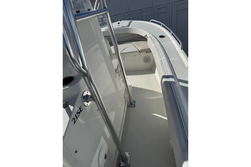 Slide: The Image of 2015 Parker 21SE Center Console boat interior with stainless steel railings. - 9