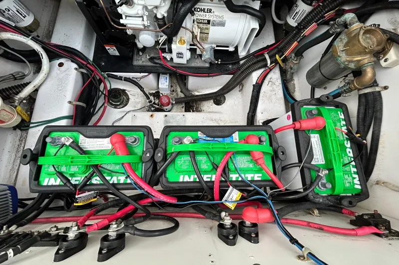 Slide: The Image of Engine compartment of a 2007 Pro-Line 32 Express with Interstate batteries and Kohler power system. - 107