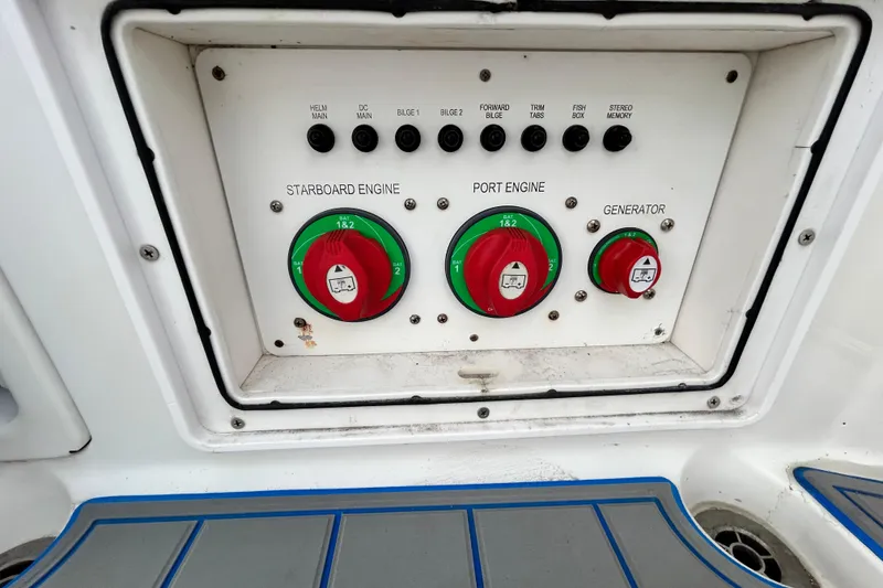 Slide: The Image of Control panel of a 2007 Pro-Line 32 Express boat with engine and generator switches. - 108