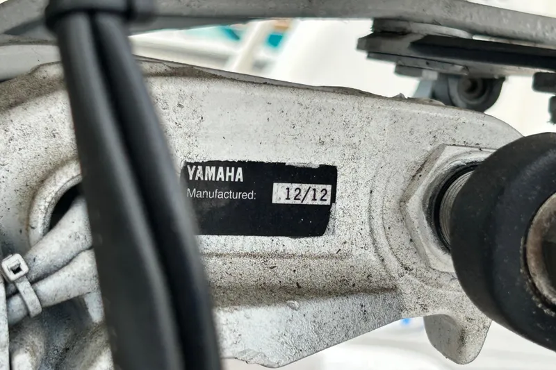 Slide: The Image of Close-up of Yamaha engine part, manufactured December 2012, on a 2007 Pro-Line 32 Express boat. - 114