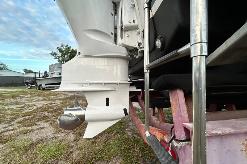 Slide: The Image of 2007 Pro-Line 32 Express boat engine and propeller on trailer. - 15
