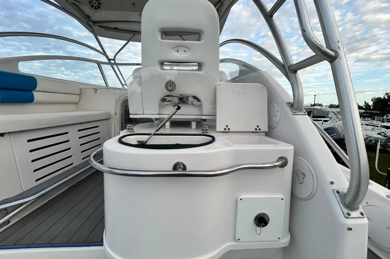 Slide: The Image of 2007 Pro-Line 32 Express boat interior with seating and helm station. - 39