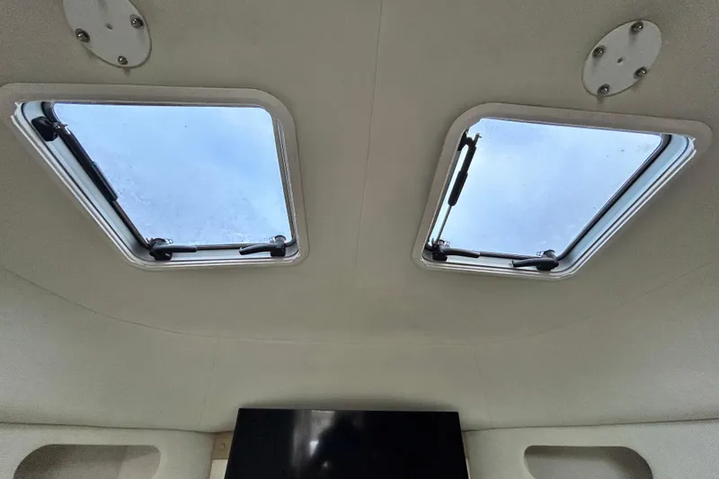 Slide: The Image of Interior view of 2007 Pro-Line 32 Express boat with dual skylights. - 82