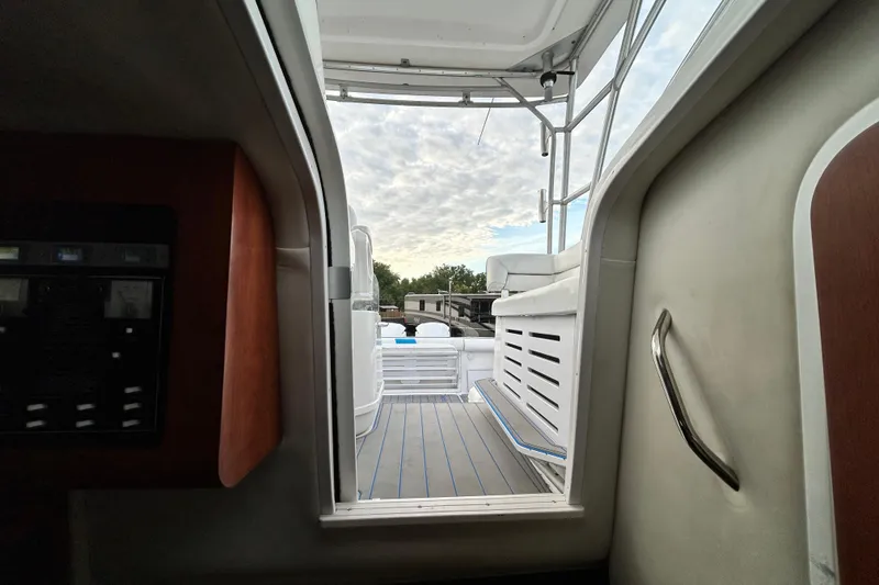 Slide: The Image of Interior view of 2007 Pro-Line 32 Express boat, showcasing deck and seating area. - 87
