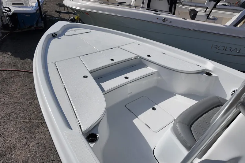 Slide: The Image of 2026 Blazer PureBay 2400 boat deck, featuring sleek design and spacious seating. - 5